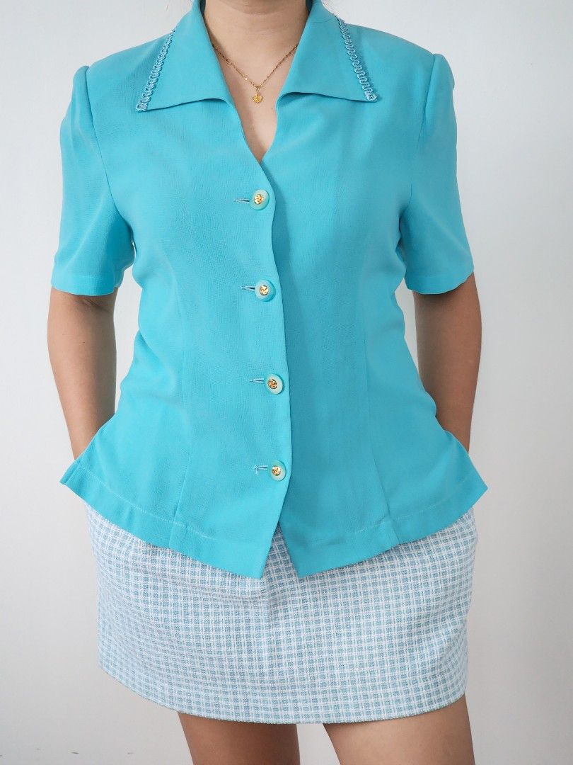 turquoise vintage button-up blouse (Category: Shirts) located in Batangas. Submitted by curatedbylisilaloop (Listing ID 1465419448, Image 1). Description: MODERN STATELY | pretty collar | turquoise vintage button-up blouse w/ pretty accent buttons front & back 🩵 Size: M-L (M on tag) Bust: 38".