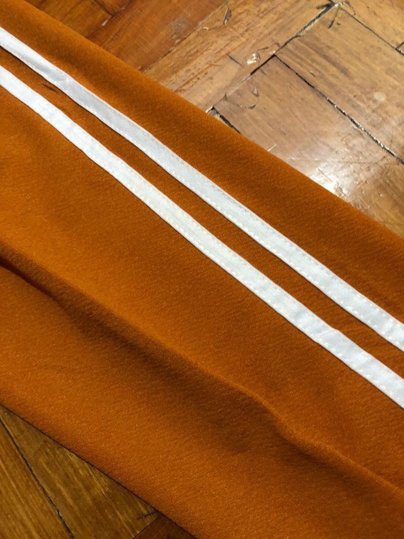 [U] Kids Orange track pants (Category: Babies & Kids Fashion) located in San Juan City. Submitted by ttanmien (Listing ID 1465541595, Image 2). Description: ⚜️✨⚜️✨⚜️✨⚜️✨⚜️✨⚜️ 💁🏻‍♀️SELLING PRICE: ₱100 Original Price: Around ₱200 💁🏻‍♀️Size: Width x Length = 26 inch x 30 inch Waist(width measurement) Garterized stretchable size waist Waist to bottom (length measurement) Tag Size: 150 (May fit kids from 6 year old to 10 years old above depending 