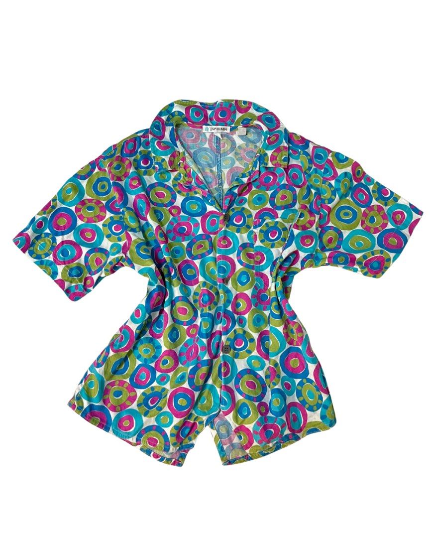 Ukay’ed Vintage Pieces (Category: Blouses) located in Bacolod City. Submitted by wisaaaaaa (Listing ID 1465526270, Image 2). Description: - Brand: Anne Klein - Size: 4P (Petite) - Color: Vibrant turquoise - Material: Silky satin with a smooth drape - Design: V-neck with a dramatic cascading center ruffle - Styling: Great for layering under blazers or wearing on its own.