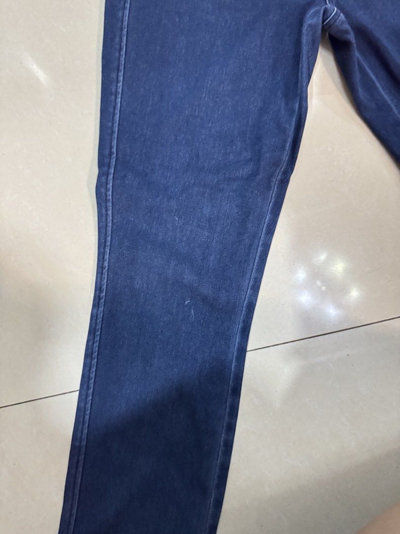 Uniqlo Denim Jeans Medium Blue Size M (Category: Jeans) located in Quezon City. Submitted by sweetlyluxe (Listing ID 1465483065, Image 3). Description: - Brand: Uniqlo - Color: Dark blue wash - Size: M (Fits waist 63-69cm, hips 88-94cm) - Material: Comfortable cotton, polyester, and spandex blend with stretch - Fit: Classic straight leg - Condition: Clean interior tags intact, great everyday jeans.