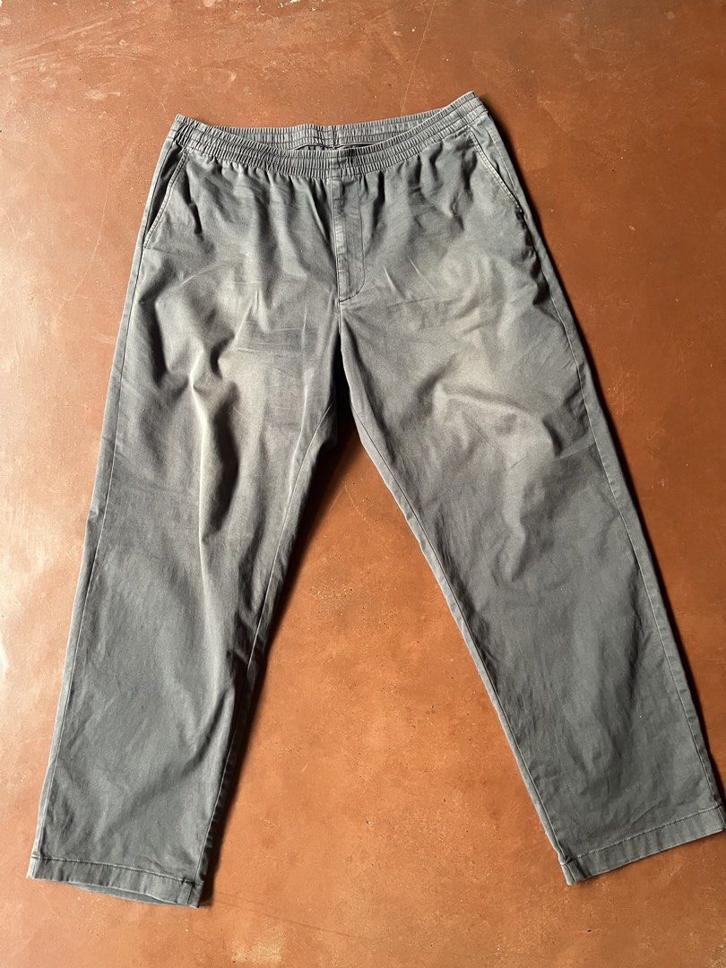 Uniqlo Stretch Easy Ankle Pants - Grey (Category: Trousers) located in Davao. Submitted by dwprwyn (Listing ID 1465505223, Image 1). Description: Size XL on tag. Dimensions (flat measurements, in inches): - 13 1/2” front rise - 8 1/2” leg opening - 15” thigh - 28” inseam - 41” outseam - 18” waist.