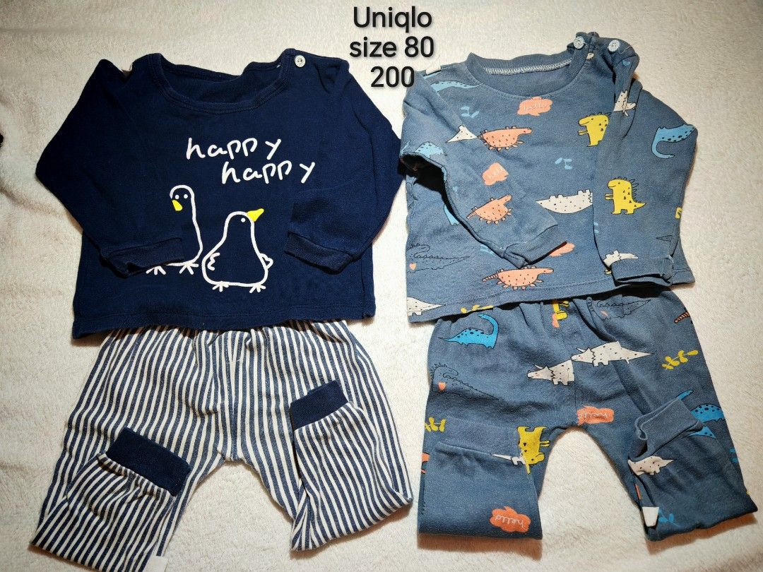 Uniqlo size 80 baby pajama sets bundle (Category: Babies & Kids Fashion) located in Quezon City. Submitted by maypamor (Listing ID 1465503495, Image 1). Description: - Brand: Uniqlo - Size: 80 - Quantity: 2 sets - Set 1: Dark blue top with happy penguin print + striped pants - Set 2: Blue top with all-over dinosaur print + matching pants - Material: Soft 100% cotton, super comfy for sleep or lounge - Features: Shoulder buttons for quick and easy 