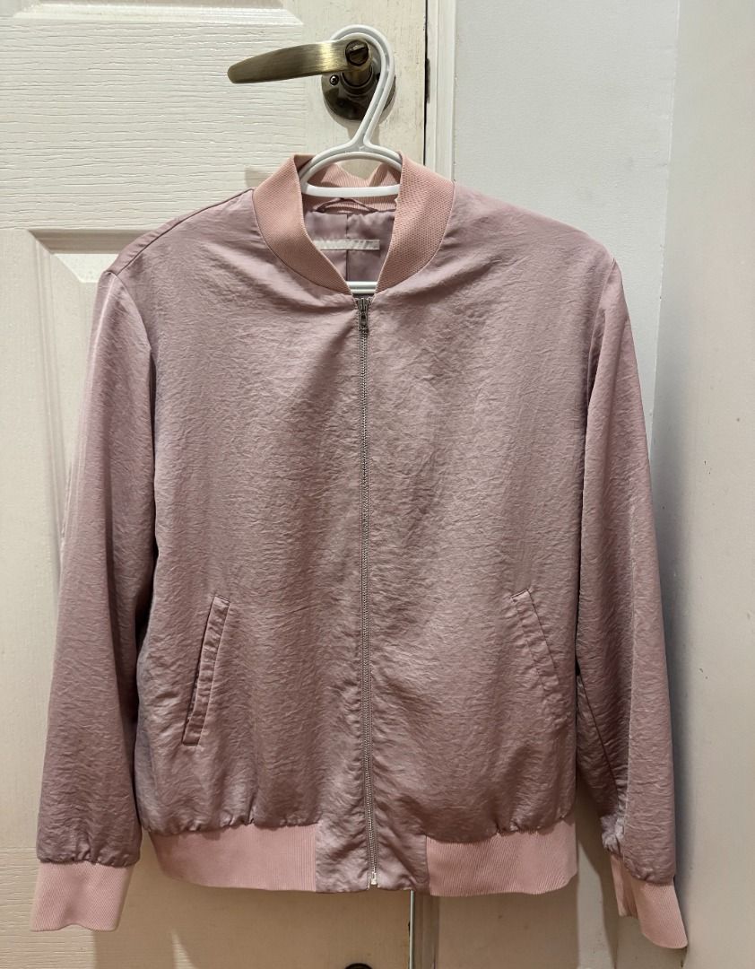 Uniqlo Soft Bomber Jacket | Pink | Size L (Category: Coats, Jackets and Outerwear) located in Makati City. Submitted by autumn.latte (Listing ID 1465514559, Image 2). Description: ♡ Perfect for chilly office/school days - Color: Dusty pink - Material: Smooth satin with soft lining - Closure: Full front zipper - Details: Ribbed knit collar, cuffs, and hem in lighter pink - Pockets: Two side pockets with slanted openings - Fit: Lightweight layer, i