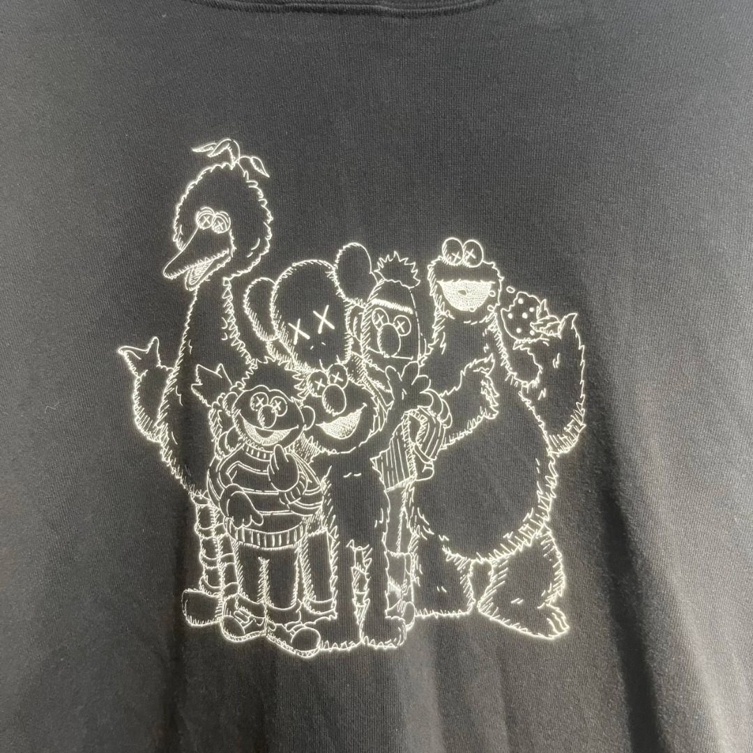 Uniqlo x Kaws (Category: Coats, Jackets and Outerwear) located in Mariveles. Submitted by akidfromnowherethrift (Listing ID 1465488615, Image 2). Description: Kaws x Uniqlo Dimes: 19x23 Size: S Color rate: 9/10 Condition: Excellent Condition.