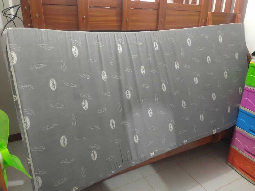 Uratex Foam Mattress Grey Feather Pattern (Category: Bed Frames & Mattresses) located in Tayug. Submitted by mikay121996 (Listing ID 1465414750, Image 1). Description: single 4" - Brand: Uratex (Trusted quality) - Design: Stylish all-over feather print - Size: Standard single or double - Comfort: Decent thickness, ideal for daily sleeping - Condition: Good, with minor fabric wrinkling from storage - Availability: Ready for pickup.