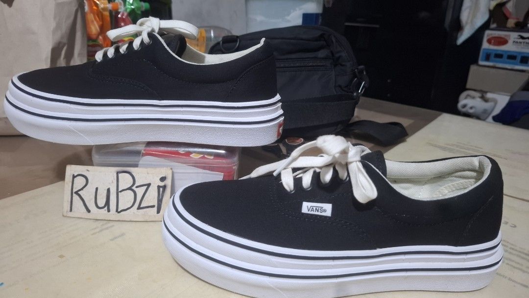 Vans ComfyCush Era Black White Platform (Category: Sneakers) located in Marikina City. Submitted by rubzi_33 (Listing ID 1465499934, Image 3). Description: - Brand: Vans Era - Color: Black canvas with white laces and contrast stitching - Sole: Double-stacked platform with classic gum waffle outsoles - Comfort: ComfyCush insoles with a cute polka dot inner pattern - Details: Clean white foxing stripe and extra height - Condition: slightly used -pr