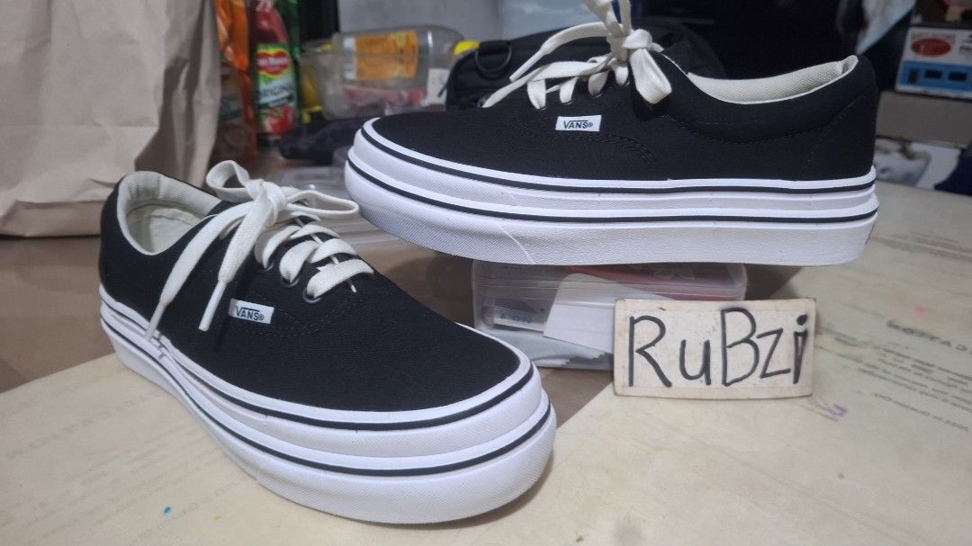 Vans ComfyCush Era Black White Platform (Category: Sneakers) located in Marikina City. Submitted by rubzi_33 (Listing ID 1465499934, Image 1). Description: - Brand: Vans Era - Color: Black canvas with white laces and contrast stitching - Sole: Double-stacked platform with classic gum waffle outsoles - Comfort: ComfyCush insoles with a cute polka dot inner pattern - Details: Clean white foxing stripe and extra height - Condition: slightly used -pr