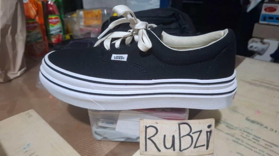 Vans ComfyCush Era Black White Platform (Category: Sneakers) located in Marikina City. Submitted by rubzi_33 (Listing ID 1465499934, Image 2). Description: - Brand: Vans Era - Color: Black canvas with white laces and contrast stitching - Sole: Double-stacked platform with classic gum waffle outsoles - Comfort: ComfyCush insoles with a cute polka dot inner pattern - Details: Clean white foxing stripe and extra height - Condition: slightly used -pr