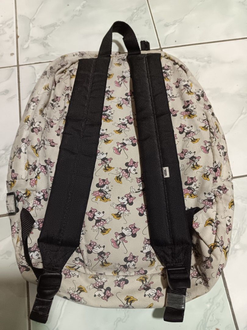 Vans Off The Wall Minnie Mouse Backpack (Category: Backpacks) located in Manila. Submitted by caaths_collection (Listing ID 1465468541, Image 2). Description: - Vans backpack with an all-over Minnie Mouse print - Neutral beige canvas background with contrasting black adjustable shoulder straps - Convenient front zippered pocket for extra storage and easy access - Features the classic Vans 'Off The Wall' patch logo stitched on the front - Great si