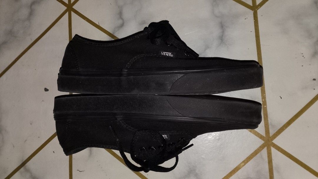 Vans Triple Black Authentic Sneakers (Category: Sneakers) located in Rizal. Submitted by akosilelouh71119 (Listing ID 1465512145, Image 2). Description: - Brand/Model: Vans Low-Top Sneakers - Color: All-Black - Size: US Men's 8 / US Women's 9.5 - Condition: Great everyday pair; interior fabric lining shows normal wear with slight dirt buildup - Features: Classic lace-up front, metal eyelets, and signature black rubber waffle outsoles - Perfect fo