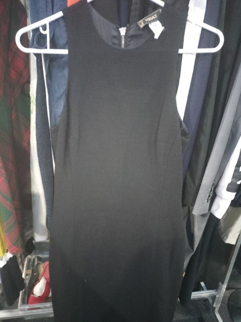 Versace dress (Category: Dresses) located in Quezon City. Submitted by dex.colletions (Listing ID 1465524788, Image 2). Description: authentic preloved versace black dress pm.