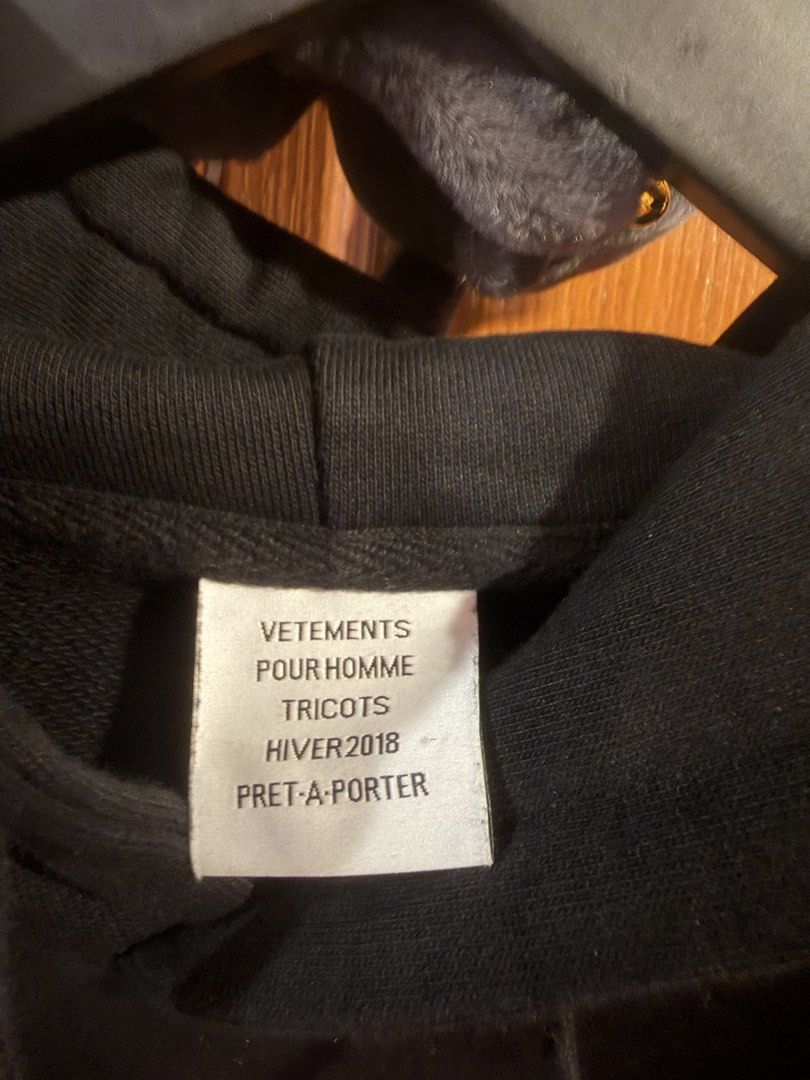 Vetemets hoodie hoodie (Category: Coats, Jackets and Outerwear) located in Quezon City. Submitted by djrakrakantodamax (Listing ID 1465485372, Image 3). Description: - Brand: Vetements (Hiver 2018 by Demna Gvasalia) - Color: Black with colorful embroidered "sweater" lettering across the chest - Size: Medium - Material: 80% cotton, 20% polyester (heavyweight fleece fabric) - Features: Kangaroo pocket, drawstring hood, long sleeves - Origin: Made i