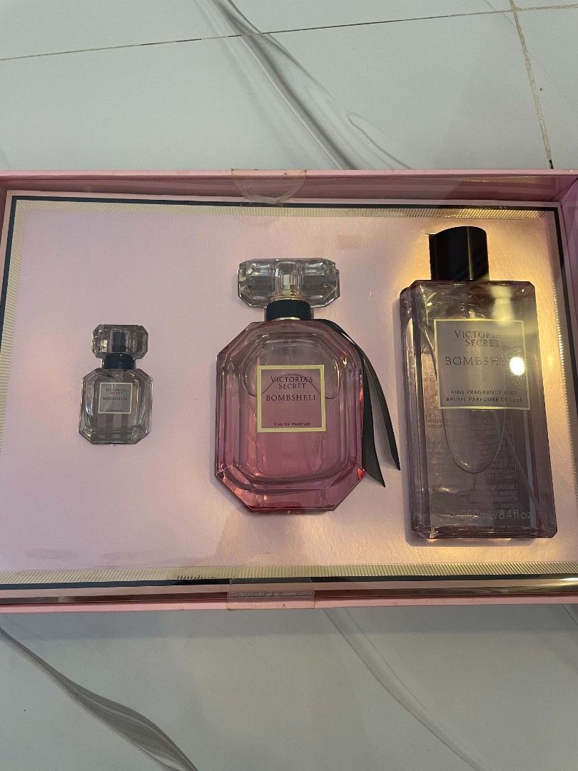 Victoria's Secret Bombshell Gift Set (Category: Fragrance & Deodorants) located in Pasay City. Submitted by varicamic91286 (Listing ID 1465445638, Image 1). Description: - 100% Authentic Victoria's Secret Bombshell Full Gift Set - Brand new, unopened, and comes in its original pink presentation box (MFG: 02/24) - Fragrance Notes: Purple passion fruit, Shangri-La peony, and vanilla orchid - Set Inclusions: * Eau de Parfum (100ml / 3.4 fl oz) * Min
