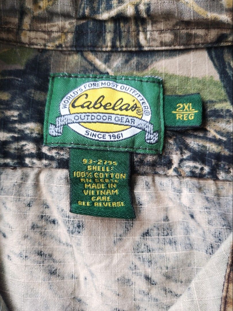 vintage Cabela's Seclusion 3D camouflage long-sleeve button-down (Category: Coats, Jackets and Outerwear) located in Manila. Submitted by historicthrift (Listing ID 1465406096, Image 3). Description: vintage Cabela's Seclusion 3D camouflage long-sleeve button-down Size 2XL Dimes 30X31.