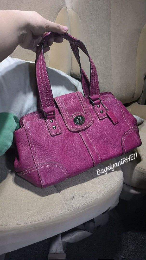 Vintage Coach Hamilton Shoulder Bag (Category: Luxury Bags & Wallets) located in Quezon City. Submitted by 88bagelya_ni_rhen88 (Listing ID 1465547333, Image 1). Description: - Authentic Coach handbag in vibrant bright pink pebbled leather - Secure front flap with classic turnlock closure - Comfortable dual shoulder straps with chic contrast white stitching - Sleek silver-tone hardware and matching leather side hangtag - Structured bottom corners 