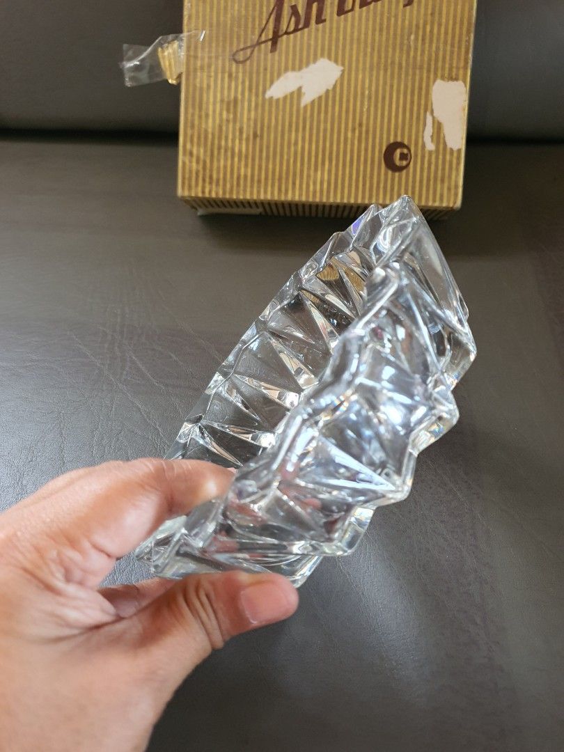 Vintage Crystal Ashtray with Original Box (Category: Vintage Collectibles) located in Catbalogan. Submitted by jncetpangz (Listing ID 1465573881, Image 2). Description: - Heavy crystal ashtray with a stunning star-burst faceted design - Chunky, durable glass perfect for daily use - Medium size - Includes original striped cardboard box (shows minor surface wear) - From a clean, smoke-free home.