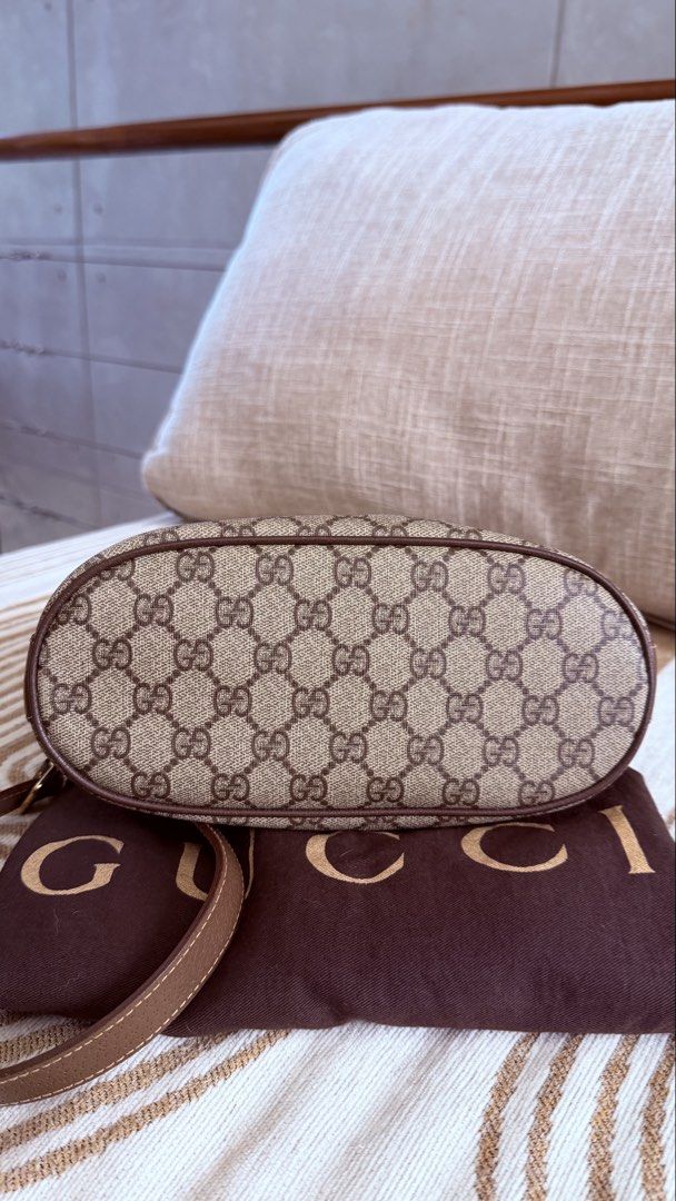 Vintage Gucci Monogram Bucket Bag (Category: Luxury Bags & Wallets) located in Rizal. Submitted by kwisee (Listing ID 1465387569, Image 3). Description: Authentic Vintage Gucci Monogram Bucket Bag in brown GG canvas and leather Inclusions: original dust bag please refer to the last photo for the flaw. some normal signs of use. no issue on the canvas. no powdering in the bag lining..