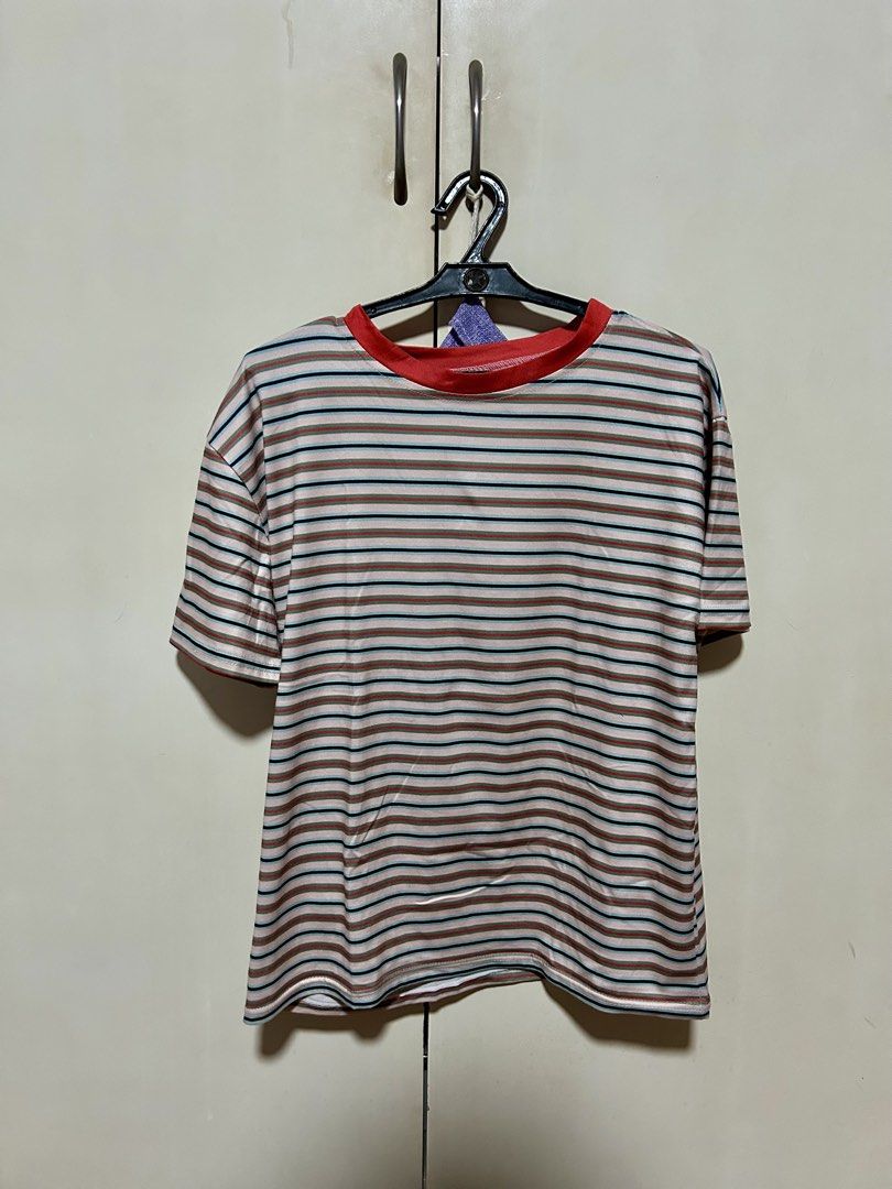 Vintage Multi-stripe T-shirt with Red Collar (Category: Blouses) located in Makati City. Submitted by monicavazquez (Listing ID 1465485209, Image 1). Description: Casual multi-stripe t-shirt featuring pink, green, and dark blue stripes with a red ribbed collar. Lightweight and pairs easily with denim. Grab it now!.