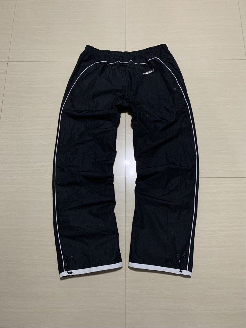 VINTAGE NIKE TRACK PANTS (Category: Activewear) located in Manila. Submitted by robbyfullofnike (Listing ID 1465410016, Image 3). Description: VINTAGE NIKE TRACK PANTS 🥷🏻 • EMBROIDERED SWOOSH LOGO WITH DOUBLE SIDE LININGS • ICONIC ATHLETIC72 RUBBERIZED LOGO ON THE BACK (RIGHT SIDE) • 3 TOTAL POCKETS, INCLUDING 1 ZIPPER POCKET ON THE BACK NEAR THE ATHLETIC72 LOGO • ALL DRAWSTRING CORD LOCKS FEATURE EMBOSSED SWOOSH LOGOS Size XL on tag • Waist: F