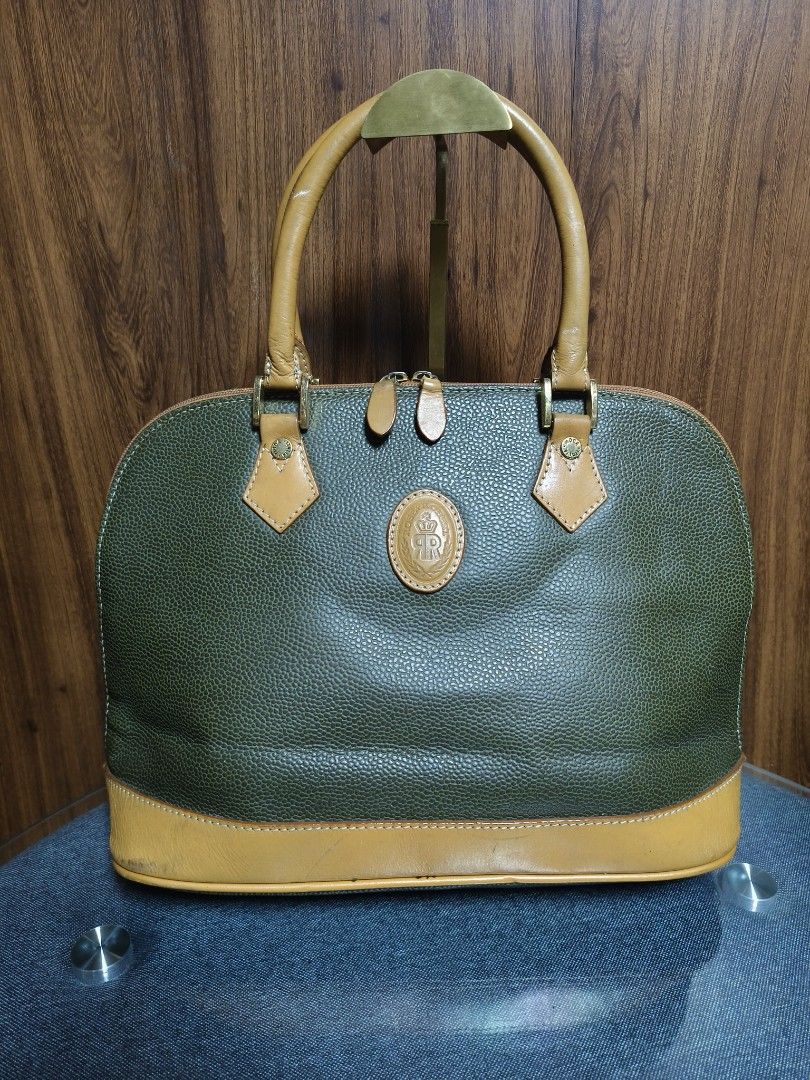 Vintage ROSES & ROBERTS Structured Dome Bag (Category: Tote Bags) located in Baguio. Submitted by PreiLoveMaria (Listing ID 1465514163, Image 2). Description: Vintage ROSES & ROBERTS Structured Dome Bag Add a touch of classic sophistication to your wardrobe with this charming vintage dome satchel from Roses & Roberts! Beautiful structured piece featuring rich textured details and classic contrast accents. Good used condition with normal signs of 