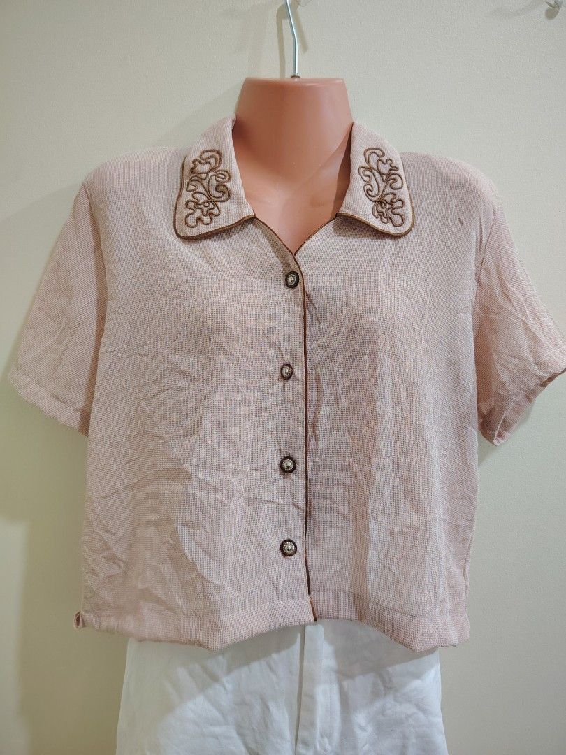 Vintage short sleeve button up collared blouse pink patterned (Category: Blouses) located in Quezon City. Submitted by timelesstreasure117 (Listing ID 1465549574, Image 1). Description: Can fit from small to large Good condition ₱70 Bundle with my other top listings to get discount 5 for ₱300 10 for ₱500 Buyer books courier of choice Payment via gcash or paymaya.