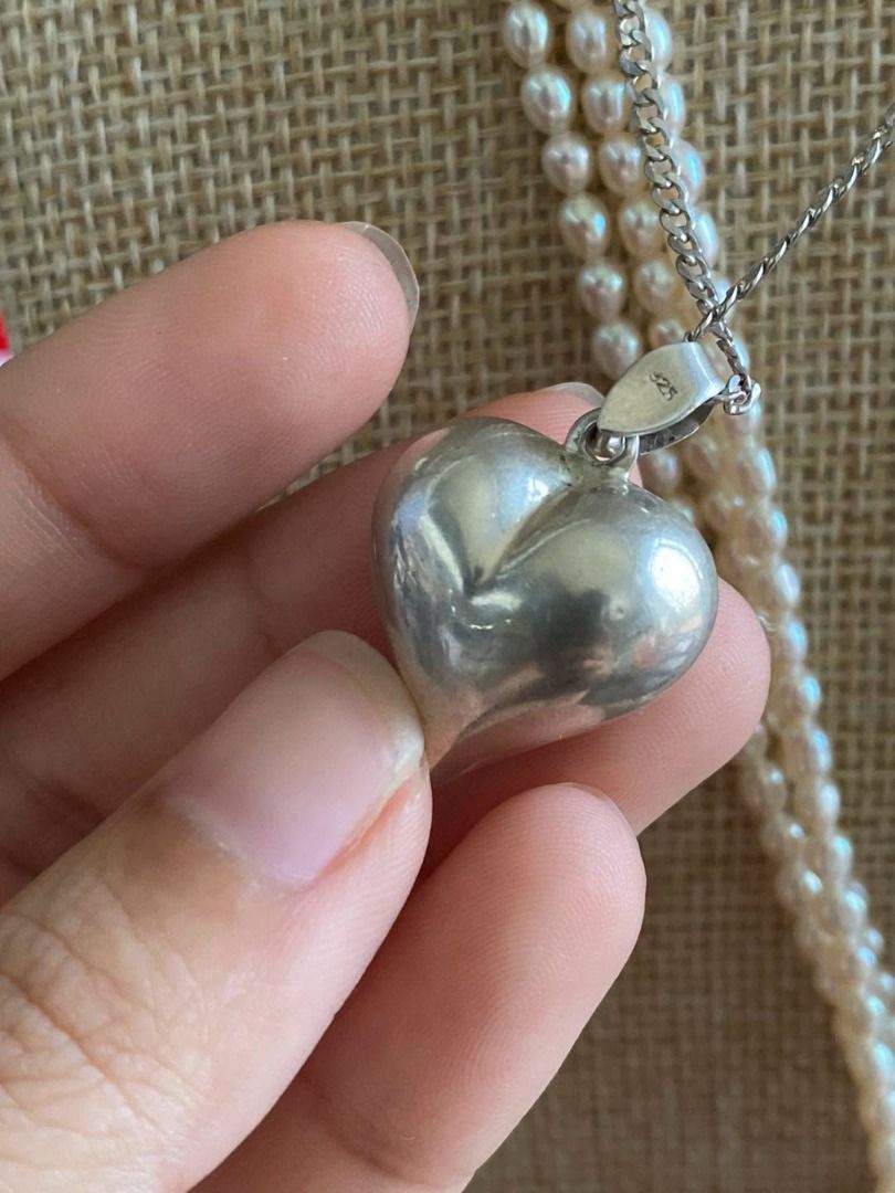 VINTAGE SILVER HEART NECKLACE (Category: Necklaces) located in Baguio. Submitted by asna_taku (Listing ID 1465464429, Image 2). Description: ✨ VINTAGE SILVER HEART NECKLACE ✨ A timeless vintage piece featuring a bold heart-shaped silver pendant paired with a delicate chain. Its classic design gives it an effortlessly elegant look—perfect worn on its own or layered with pearl and silver necklaces for a more curated style. 🤍 6G | 18 INCHES ₱3,480 