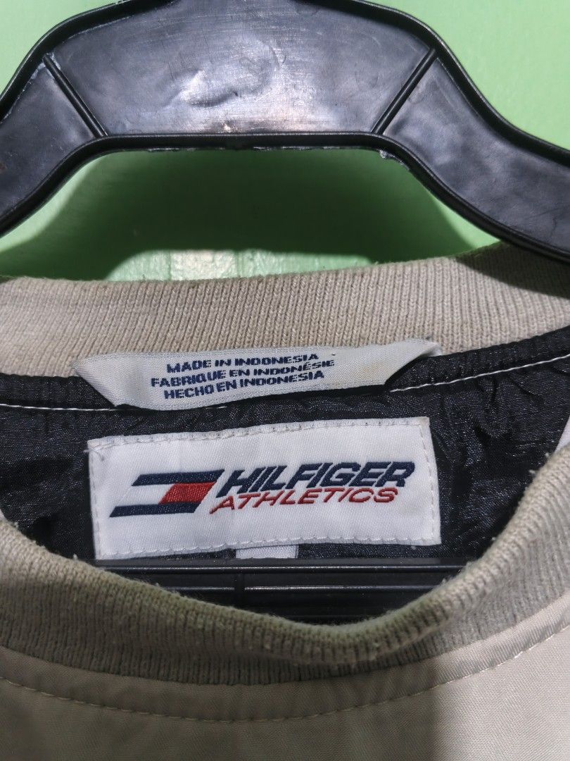 Vintage Tommy Hilfiger Athletics (Category: Coats, Jackets and Outerwear) located in San Fernando. Submitted by mfckn.benz (Listing ID 1465404410, Image 3). Description: condition still good no cracks on rubber patches size S on tag best fit XL to XXL length 28 width 25.