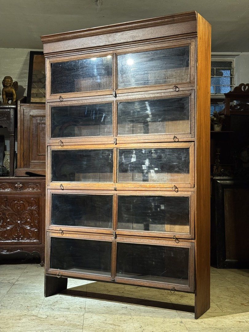 Vintage Unusual Wide Bookshelf Book Case (Category: Vintage Collectibles) located in Manila. Submitted by sinaunang_gamit (Listing ID 1465400343, Image 1). Description: Vintage Unusual Wide Bookshelf Book Case Height: 75 inches Length: 46 inches Width: 12 inches Vintage item around 1950s mid century door needs a hard push to close. common for a vintage/antique item ₱16,500.