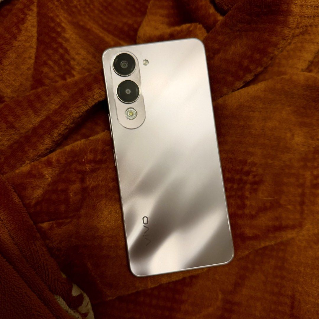 Vivo Y04 128GB (Category: Vivo) located in Taguig. Submitted by exidofficial (Listing ID 1465544318, Image 1). Description: - Brand/Model: Vivo Y04 - Storage: 128GB internal storage - RAM: 4 + 4GB RAM for smooth multitasking - Processor: Octa-core - OS: Funtouch OS 15 (Android version 15) - Design: Elegant glossy silver finish back panel - Condition: Excellent, well-maintained - Meetup location: Watsons SM BF, Dr. A Santos Ave., Sucat, Parañaque 
