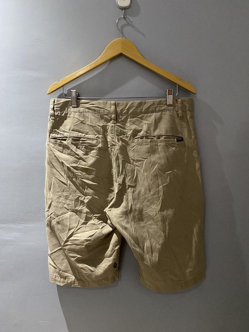 Volcom beige chino shorts size 32 (Category: Shorts) located in Bangued. Submitted by koroysthrifts (Listing ID 1465424727, Image 3). Description: - Brand: Volcom - Item: Men's Chino Shorts - Size: 32x21x10 - Color: Beige / Khaki - Closure: Button closure with zip fly - Pockets: Front hand pockets and back welt pockets with Volcom branding tag - Condition: Excellent, classic casual style for everyday wear.