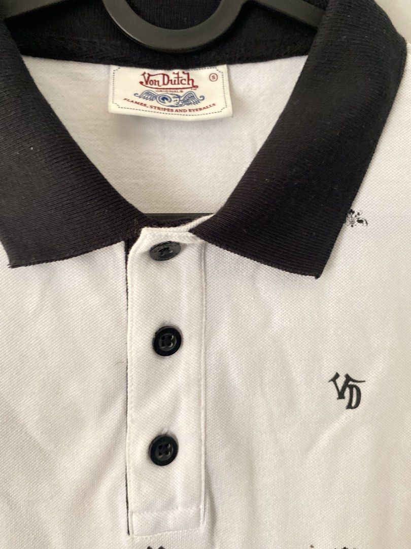 Von Dutch Monogram Polo Shirt Small (Category: Tshirts & Polo Shirts ) located in Bulacan. Submitted by knklittlecloset (Listing ID 1465483617, Image 3). Description: Von Dutch Monogram Polo Shirt - White / Black Brand: Von Dutch (authentic) Color: White with black collar & sleeve trim Design: All-over VD monogram + small logo print Material: Cotton polo, soft and breathable Condition: Good condition / like new, no major flaws, needs washing beca