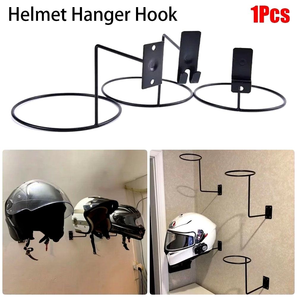 Wall mount helmet cap holder 2pcs. (Category: Hooks & Hangers) located in Valenzuela. Submitted by diane.35 (Listing ID 1465500083, Image 2). Description: - Chrome-finished steel wall rack - Ideal for motorcycle helmets, hats, or wigs - Keeps gear organized and off tables - Sturdy metal ring design - Features two screw holes for secure wall mounting - Comes in clear protective packaging.