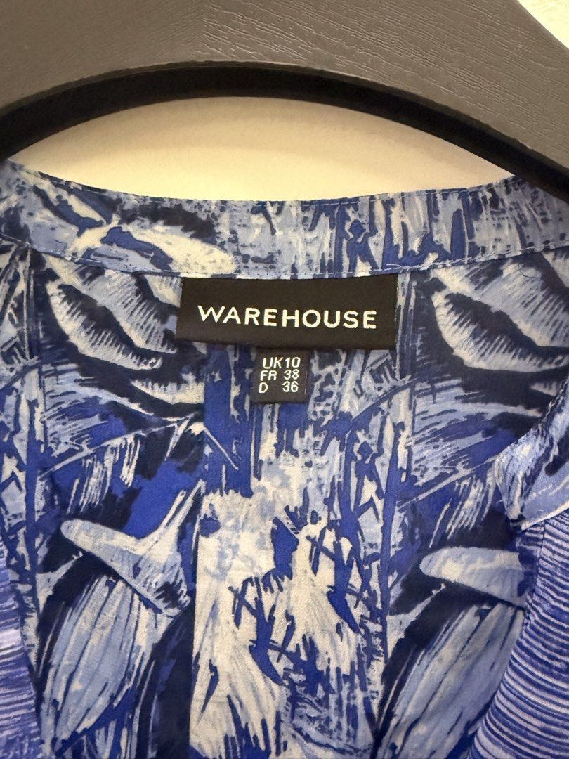 Warehouse blue printed long sleeve blouse (Category: Longsleeves) located in San Pablo. Submitted by iamtrina (Listing ID 1465408581, Image 3). Description: Fits s-medium frame Up to 36”bust Up to 34” waist slightly sheer fabric .