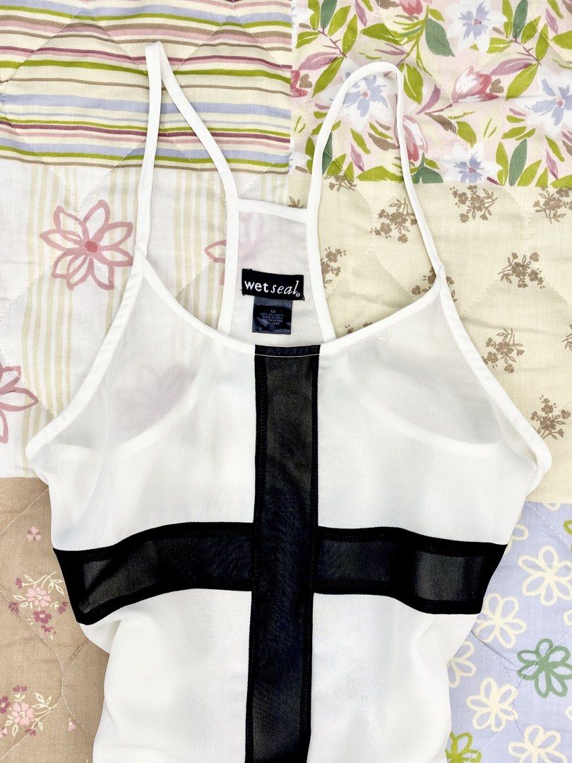 Wetseal Cybercross Shear Mesh Cami (Category: Sleeveless) located in Angeles City. Submitted by fruits.ph (Listing ID 1465431766, Image 3). Description: Measurements B:17” W:19” L:27”(Fixed Straps) Size on Tag: M Best Fit: L-XL *Flat lay measurements* Mannequin Size: M (34”; 25”) Color Rate: 10/10 Flaws: None Fabric Type:Mesh/ Non-Stretch Fabric ***Color may vary due to lighting. This item is properly washed and disinfected.*** .