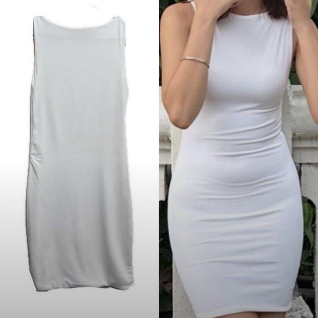White Bodycon Sleeveless Mini Dress (Category: Dresses) located in Manila. Submitted by kksantos0220983 (Listing ID 1465540395, Image 1). Description: - Color: Classic White - Style: Sleeveless bodycon dress with a simple crew neckline - Length: Above the knee - Fit: Figure-hugging and flattering - Material: Smooth and stretchy for all-day comfort - Versatility: Great for casual daytime looks or dressing up for a night out.