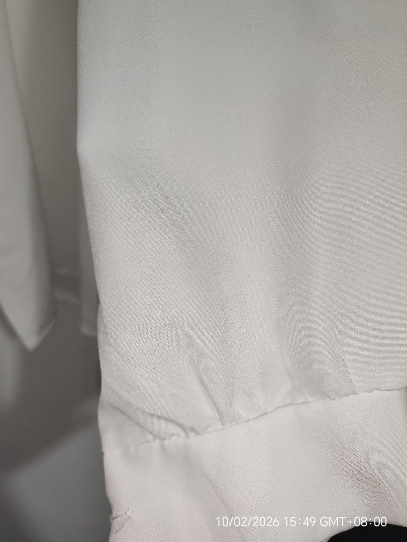 White Chiffon Long Sleeve Button-Down Blouse | XL | Never Worn (Category: Longsleeves) located in Antipolo. Submitted by purpleclover11 (Listing ID 1465445834, Image 3). Description: White chiffon long sleeve blouse Never worn. Washed once after purchase, then stored. Classic collared button-down blouse made from lightweight, flowy chiffon fabric. Long sleeves with cuffs. Easy to style for office, smart-casual, or everyday wear. Size: XL Measurem