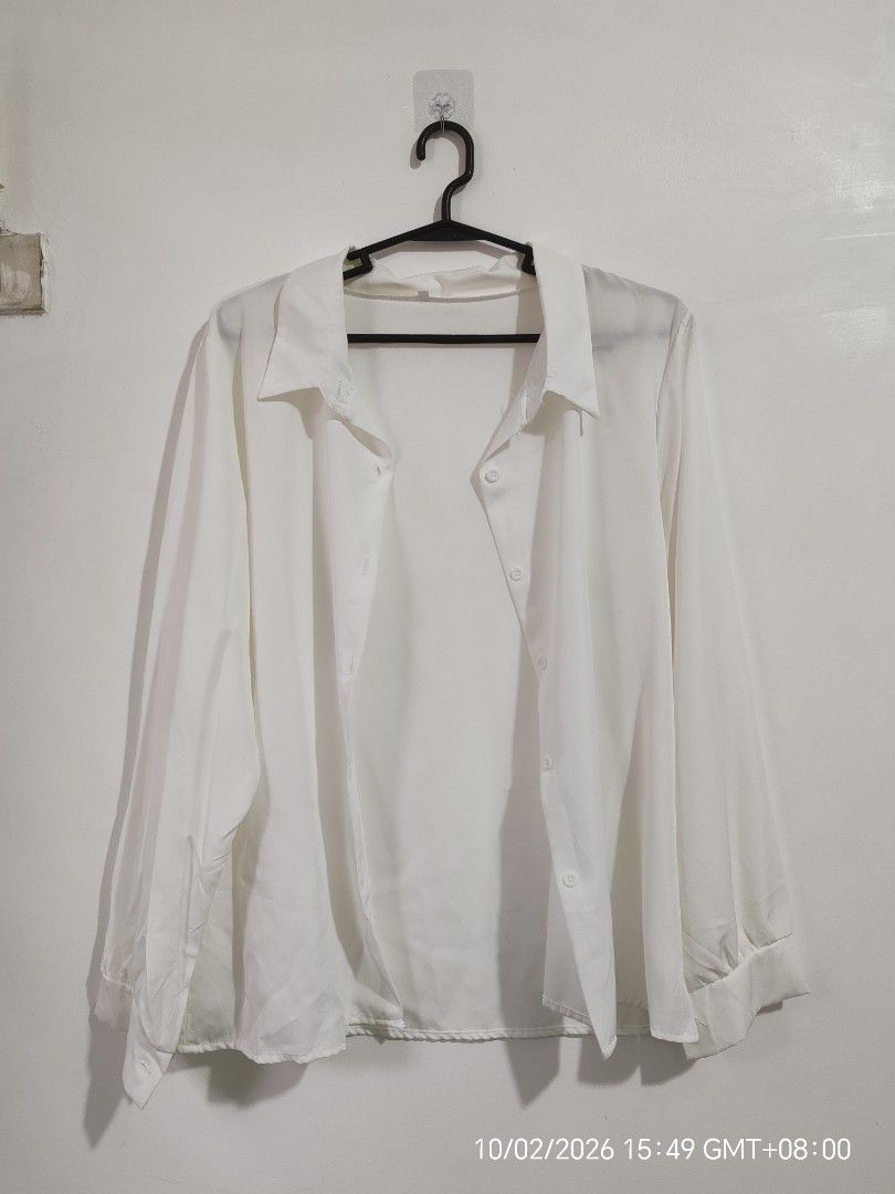 White Chiffon Long Sleeve Button-Down Blouse | XL | Never Worn (Category: Longsleeves) located in Antipolo. Submitted by purpleclover11 (Listing ID 1465445834, Image 2). Description: White chiffon long sleeve blouse Never worn. Washed once after purchase, then stored. Classic collared button-down blouse made from lightweight, flowy chiffon fabric. Long sleeves with cuffs. Easy to style for office, smart-casual, or everyday wear. Size: XL Measurem