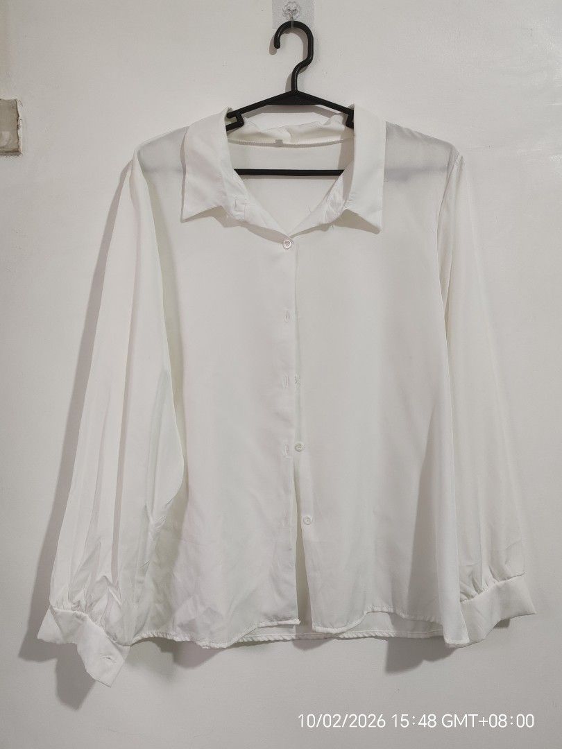 White Chiffon Long Sleeve Button-Down Blouse | XL | Never Worn (Category: Longsleeves) located in Antipolo. Submitted by purpleclover11 (Listing ID 1465445834, Image 1). Description: White chiffon long sleeve blouse Never worn. Washed once after purchase, then stored. Classic collared button-down blouse made from lightweight, flowy chiffon fabric. Long sleeves with cuffs. Easy to style for office, smart-casual, or everyday wear. Size: XL Measurem