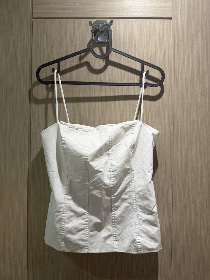 White Corset Style Spaghetti Strap Tank Top (Category: Sleeveless) located in Manila. Submitted by ekathleeen (Listing ID 1465521416, Image 1). Description: Decluttering!! 👖👚 Size: S Used twice only Loc: Makati.