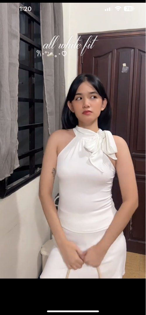 white halter neck knitted top (Category: Sleeveless) located in Manila. Submitted by sophialeigh (Listing ID 1465485522, Image 2). Description: .
