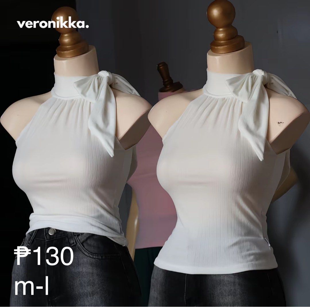 white halter neck knitted top (Category: Sleeveless) located in Manila. Submitted by sophialeigh (Listing ID 1465485522, Image 1). Description: .