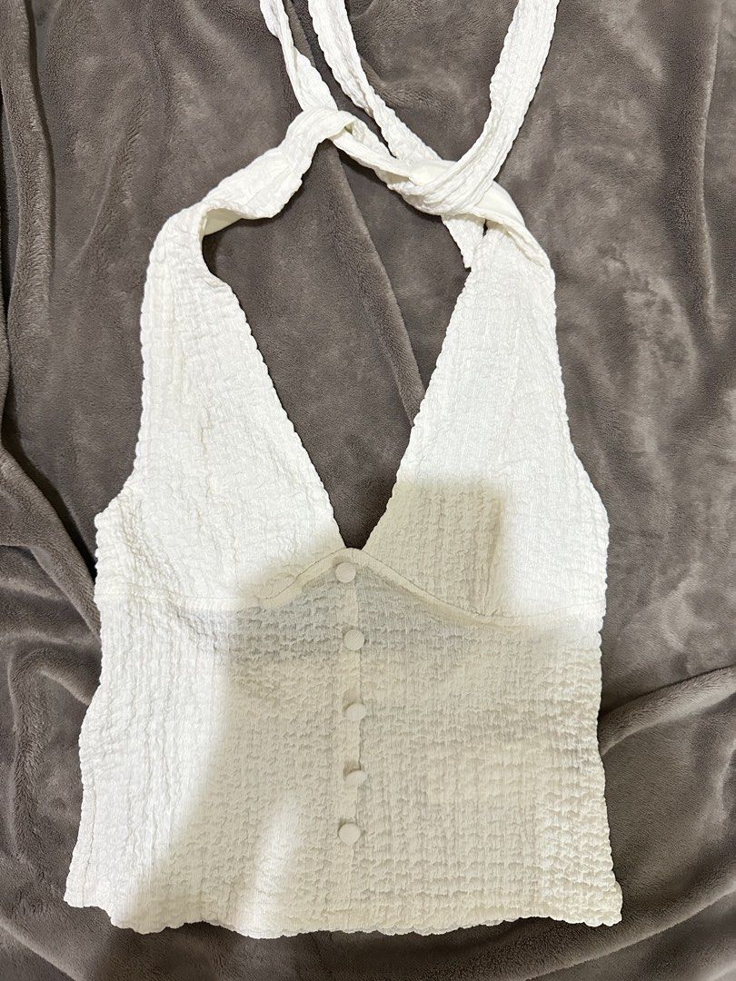 White Halter Top (Category: Sleeveless) located in Marikina City. Submitted by bxllaxox (Listing ID 1465504676, Image 1). Description: Never used.