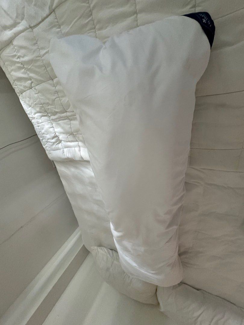 White long body pillow (Category: Bedding & Towels) located in Manila. Submitted by decluterthings888 (Listing ID 1465487746, Image 1). Description: .