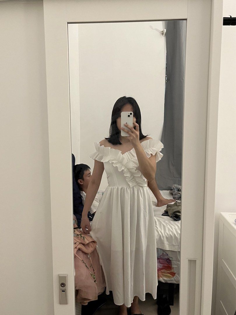 White off-shoulder ruffled midi dress (Category: Dresses) located in Cavite. Submitted by bihnibini (Listing ID 1465578369, Image 3). Description: -attended a wedding using this dress - Style: White off-shoulder midi dress with ruffled front detailing - Fit: Stretchy smocked back panel for comfort, flare skirt below the knee - Fabric: Lightweight and breathable - Occasion: Great for casual days out or weekend events -.