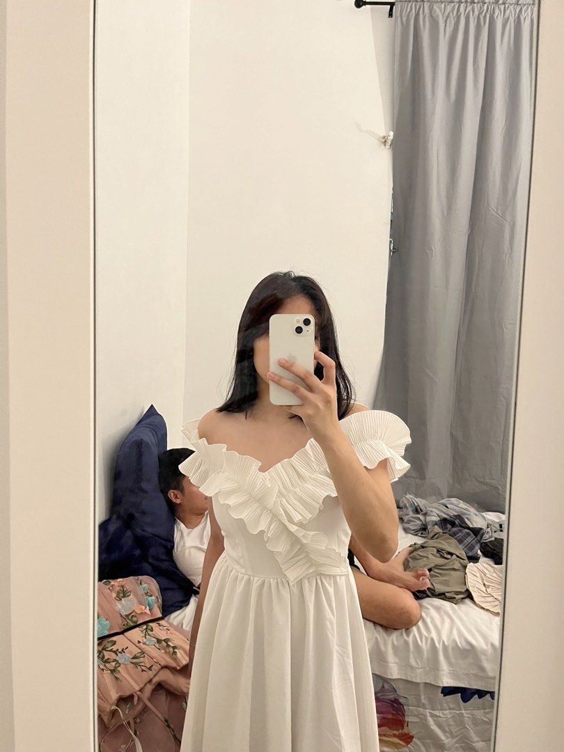 White off-shoulder ruffled midi dress (Category: Dresses) located in Cavite. Submitted by bihnibini (Listing ID 1465578369, Image 1). Description: -attended a wedding using this dress - Style: White off-shoulder midi dress with ruffled front detailing - Fit: Stretchy smocked back panel for comfort, flare skirt below the knee - Fabric: Lightweight and breathable - Occasion: Great for casual days out or weekend events -.