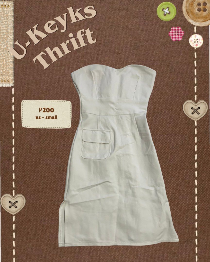 white tube mini dress (Category: Dresses) located in Cavite. Submitted by ukeyks (Listing ID 1465529608, Image 1). Description: - Design: Strapless sweetheart neckline with fitted bodice and waist panel - Functional details: Practical side pockets and a chic side slit at the hem - Fit: Best fits extra small to small (XS to S) frames .