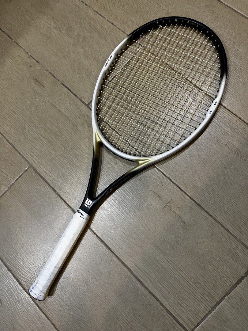Wilson Hammer HM Classic Stretch Tennis Racket (Category: Racket and Ball Sports) located in Malabon City. Submitted by crazilyvintage (Listing ID 1465533084, Image 1). Description: NEGOTIABLE FOR SURE BUYER. - Model: Wilson Hammer HM Classic Stretch tennis racket - Includes: Original black carrying case with shoulder strap - Material: 80% high modulus graphite and 20% ultra high modulus graphite - Specs: Swing index 2, recommended tension 53-63 
