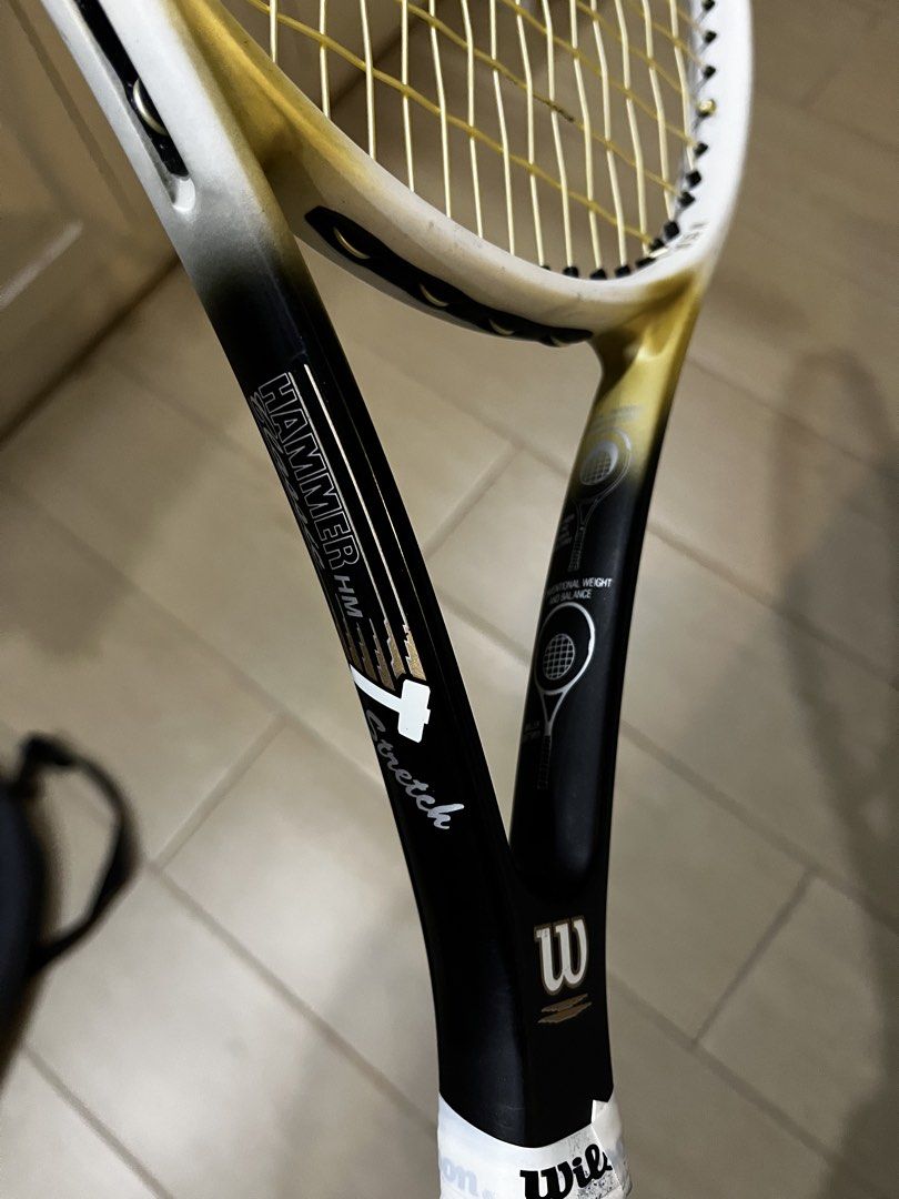 Wilson Hammer HM Classic Stretch Tennis Racket (Category: Racket and Ball Sports) located in Malabon City. Submitted by crazilyvintage (Listing ID 1465533084, Image 3). Description: NEGOTIABLE FOR SURE BUYER. - Model: Wilson Hammer HM Classic Stretch tennis racket - Includes: Original black carrying case with shoulder strap - Material: 80% high modulus graphite and 20% ultra high modulus graphite - Specs: Swing index 2, recommended tension 53-63 