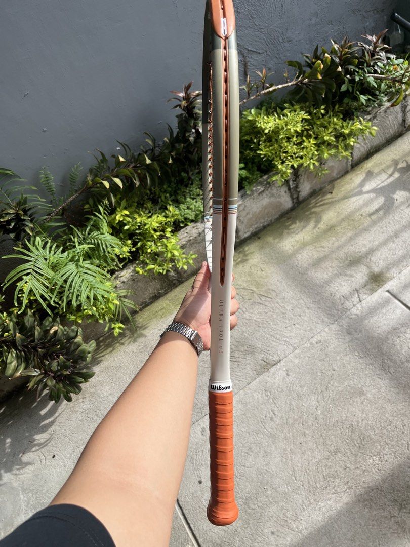 Wilson Ultra 100L V5 Dessert (Category: Racket and Ball Sports) located in Paranaque City. Submitted by krstnnns_04 (Listing ID 1465414633, Image 2). Description: Wilson Ultra 100L V5 Desert 100 sq in head size 280g unstrung Grip 2 Hybrid String: • Luxilon 4G Desert Bronze - Mains • Luxilon Element - Crosses New grip 2-3 times used lang No bag Price: 16000 (slightly negotiable) Original Price: 18.9k (check online for reference) RFS: Racket upgrad