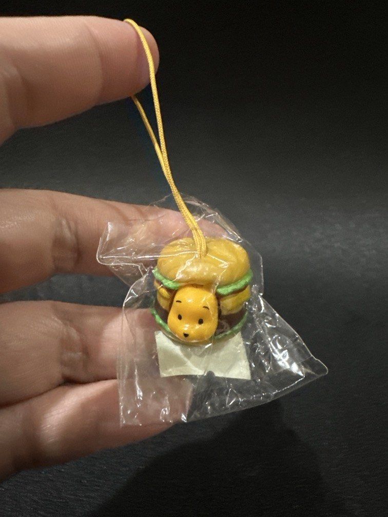 Winnie the Pooh hamburger strap charm (Category: Stationery & School Supplies) located in Manila. Submitted by krystalchewey_ (Listing ID 1465527636, Image 1). Description: Bnew Actual Photo Posted 180php.